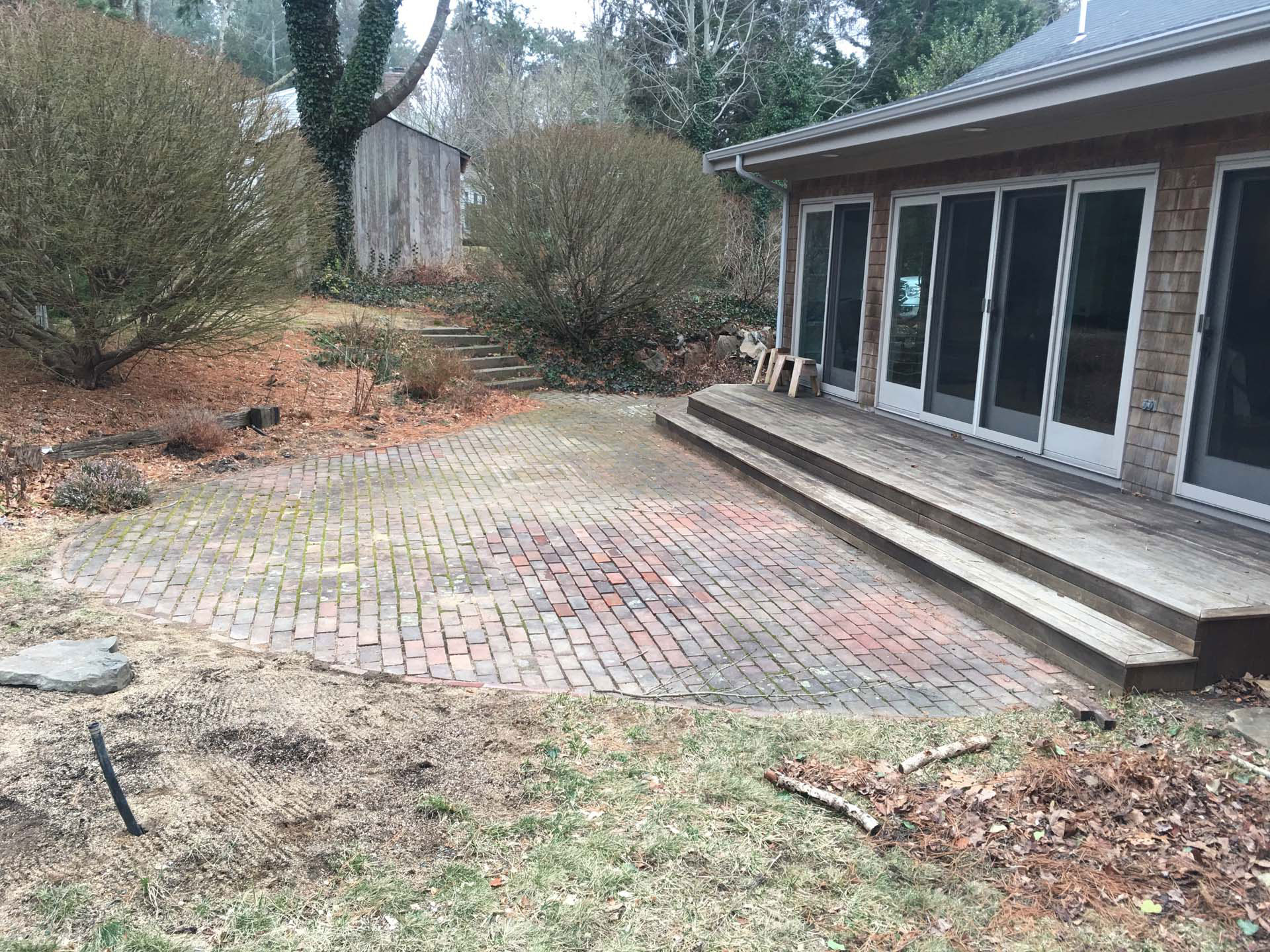 small deck & backyard patio before cleaning